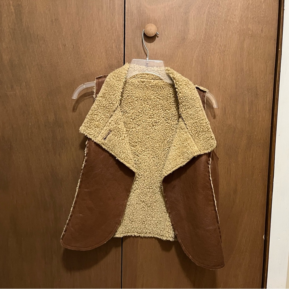 Super cute faux-leather fuzzy vest